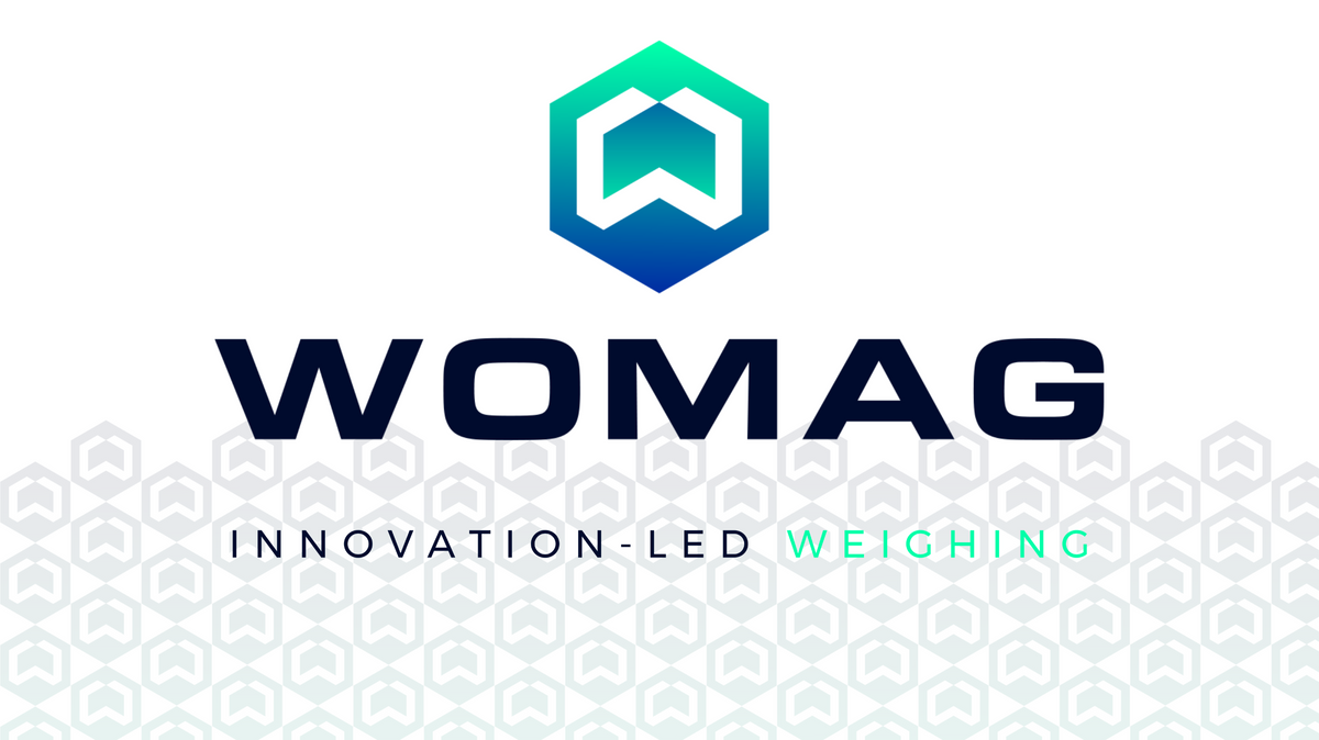 Womag logo featuring a hexagonal emblem with gradient blue and green hues above the brand name