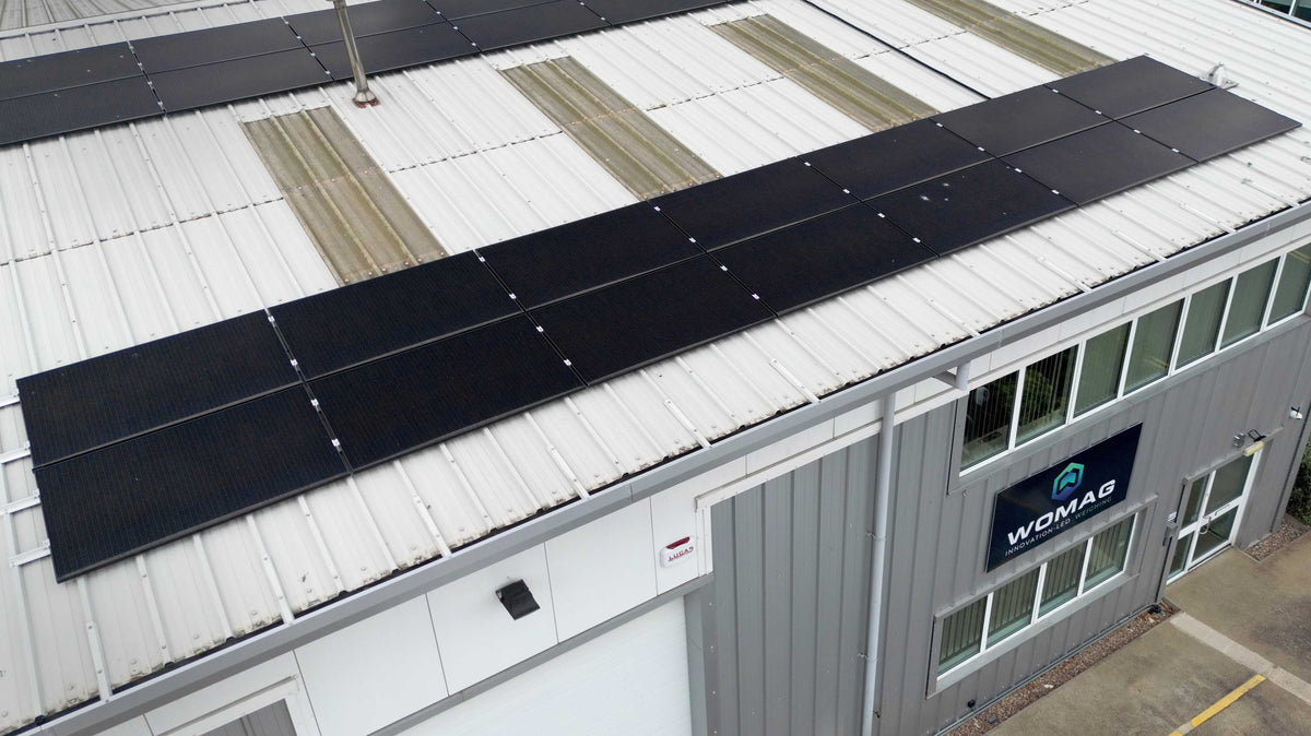 Black solar panels installed on a metal roof