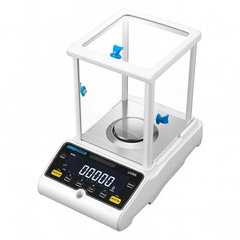 White digital analytical balance with a transparent glass enclosure and blue plastic handles, featuring the brand name ’adam’ and model designation ’luna’