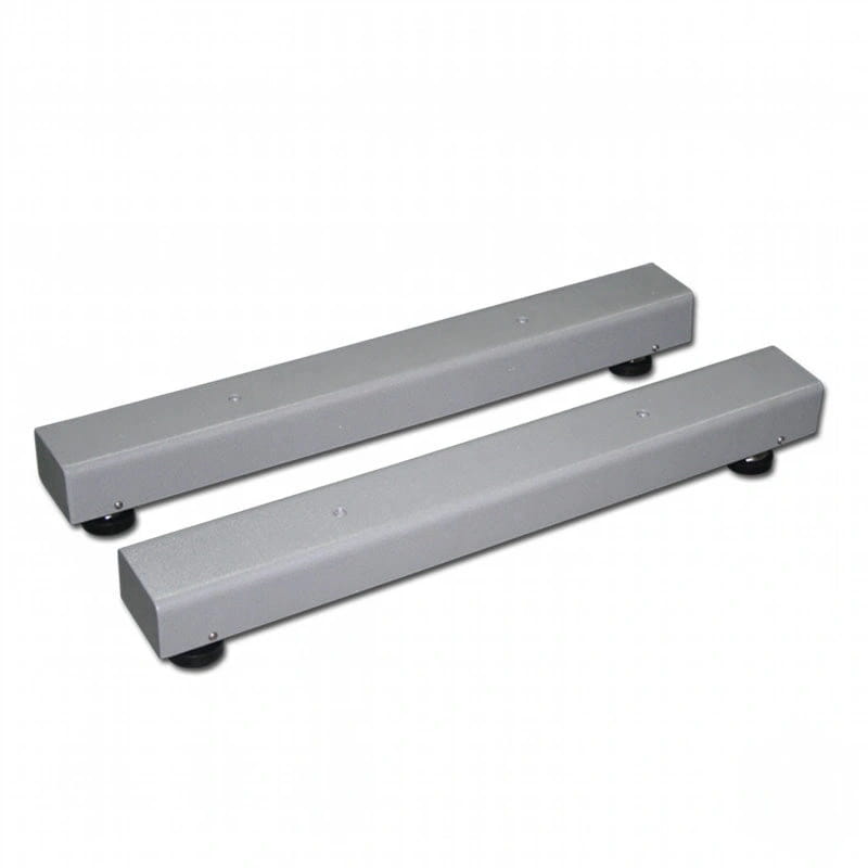 Two gray metallic rectangular bars with black rubber feet