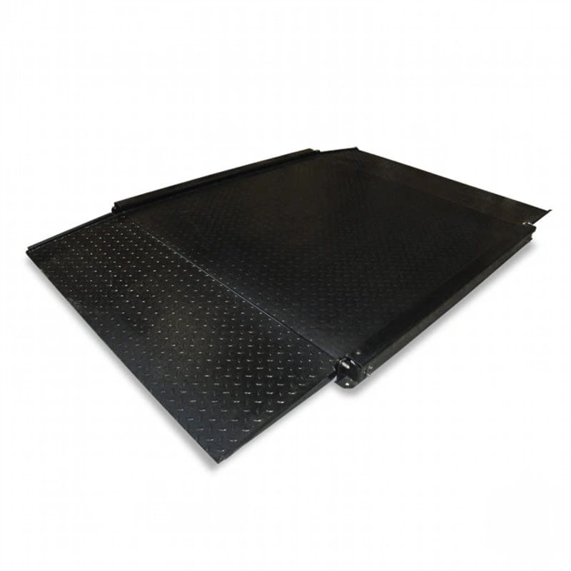 Black metal loading ramp with diamond plate texture on one side and smooth surface on the other