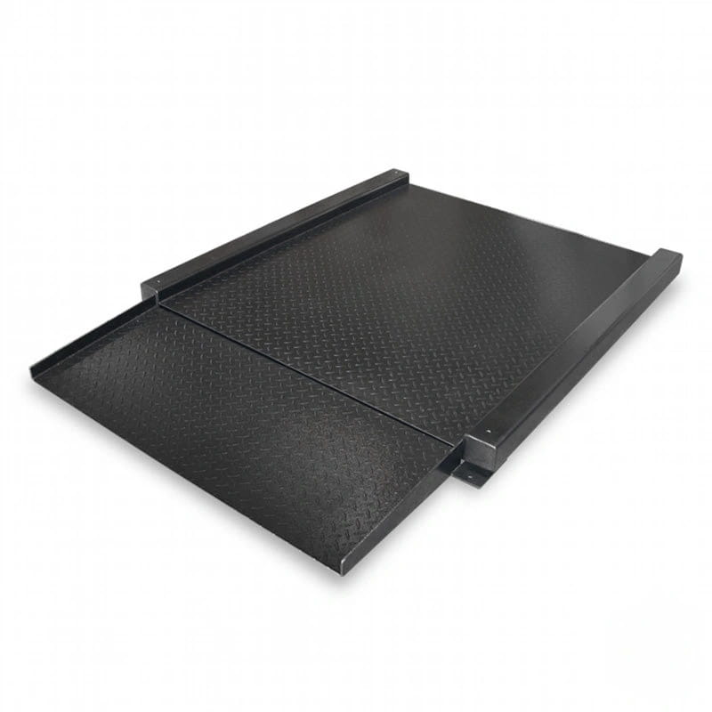Black metal loading ramp with a diamond plate texture