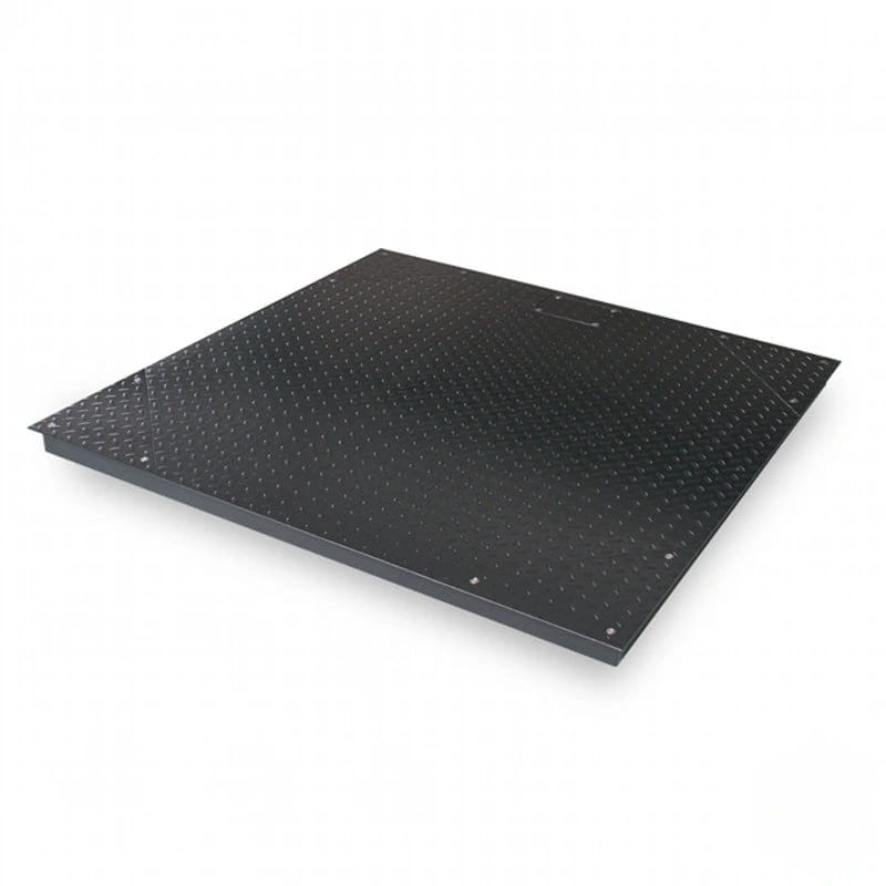 Black metal platform scale with a grid of small, evenly spaced holes across its surface