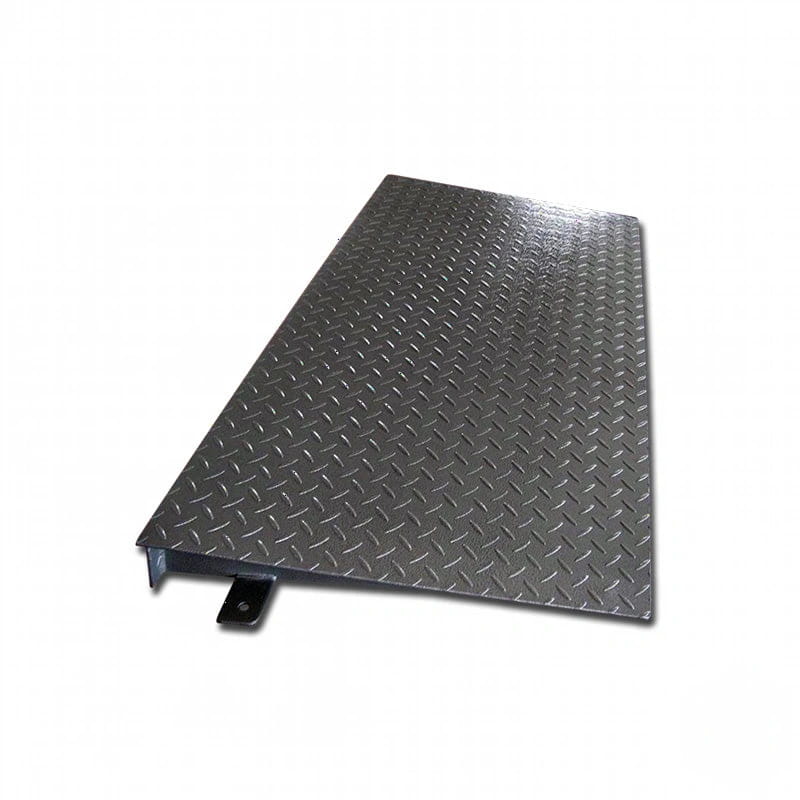 Black diamond plate metal ramp with a sturdy, textured surface and reinforced edge