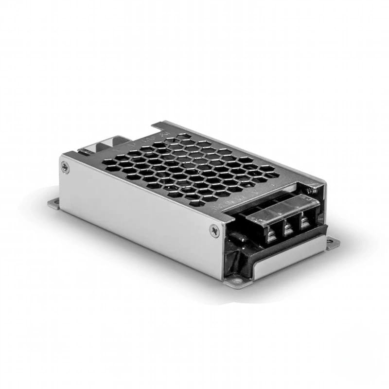 Silver metallic power supply unit with a hexagonal ventilation grille and black terminal block