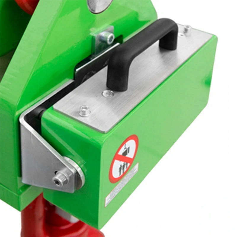 Green industrial magnet with a black handle and silver metal plate