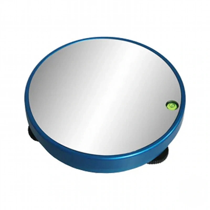 Blue-framed circular mirror with a reflective silver surface and small green indicator light