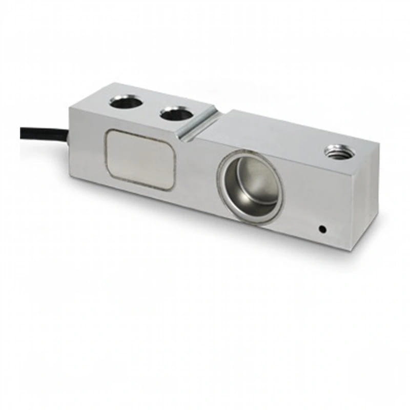 Silver metallic load cell with a rectangular body, two circular mounting holes on one side and a threaded hole near the end