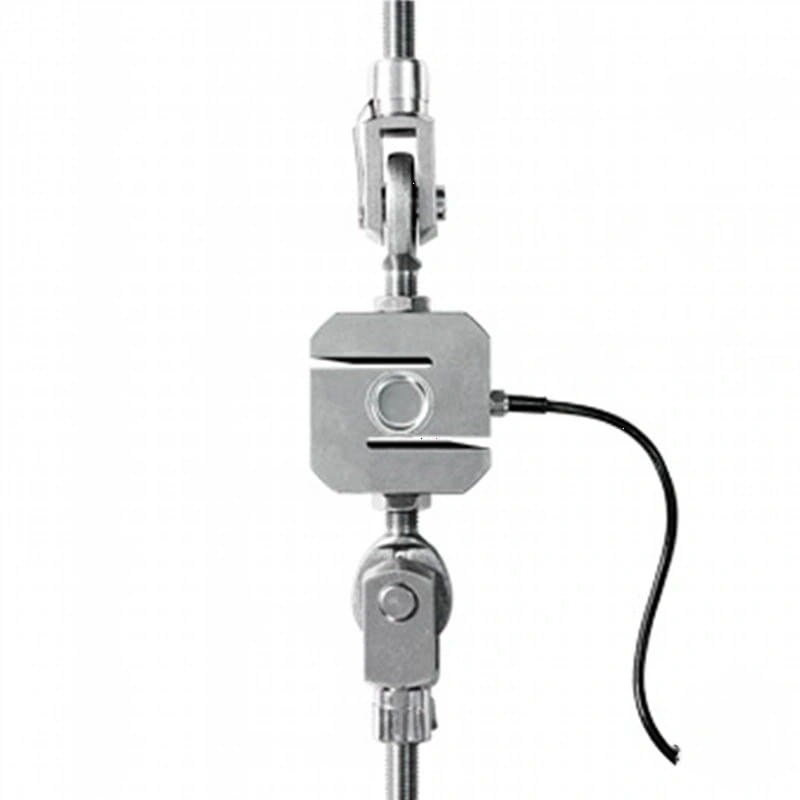 Silver metallic load cell with a black cable extending from its side