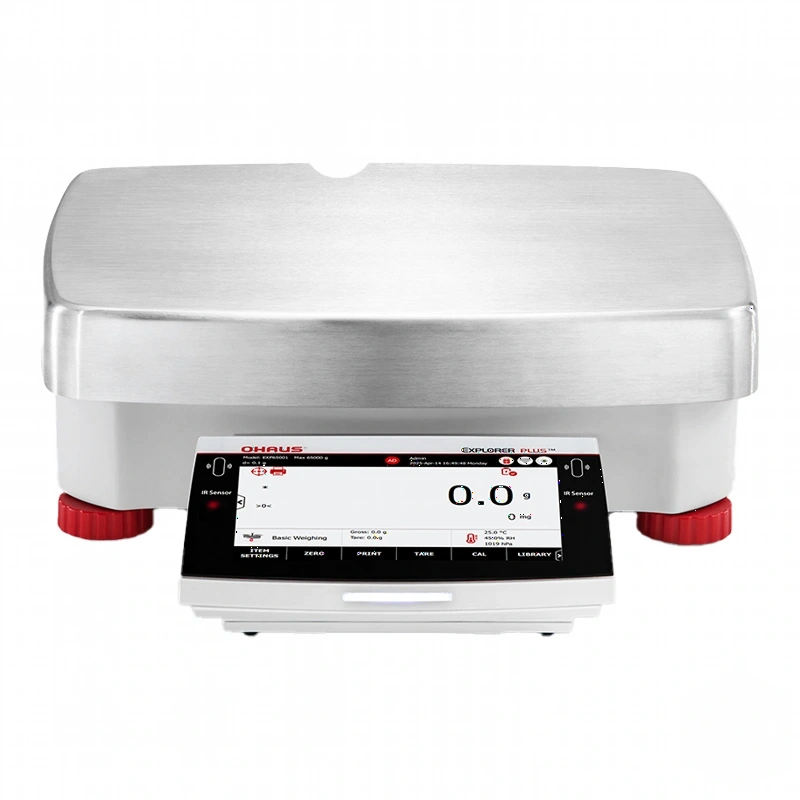 Silver stainless steel ohaus explorer plus™ analytical balance with red foot caps and a digital display showing zero weight