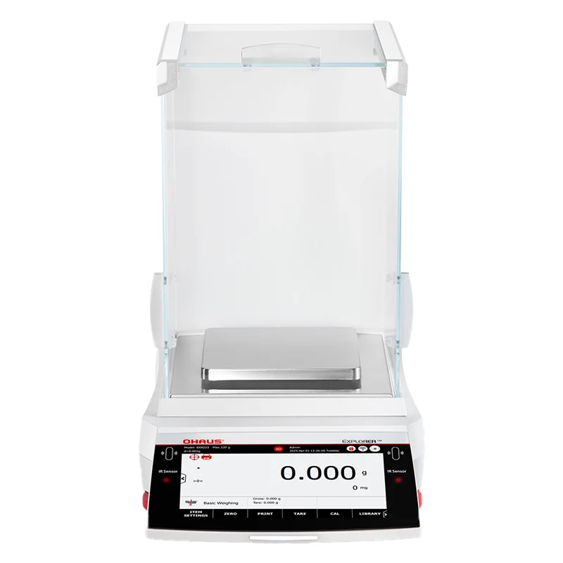 White ohaus explorer™ analytical balance with a transparent glass draft shield and digital display showing zeroed weight