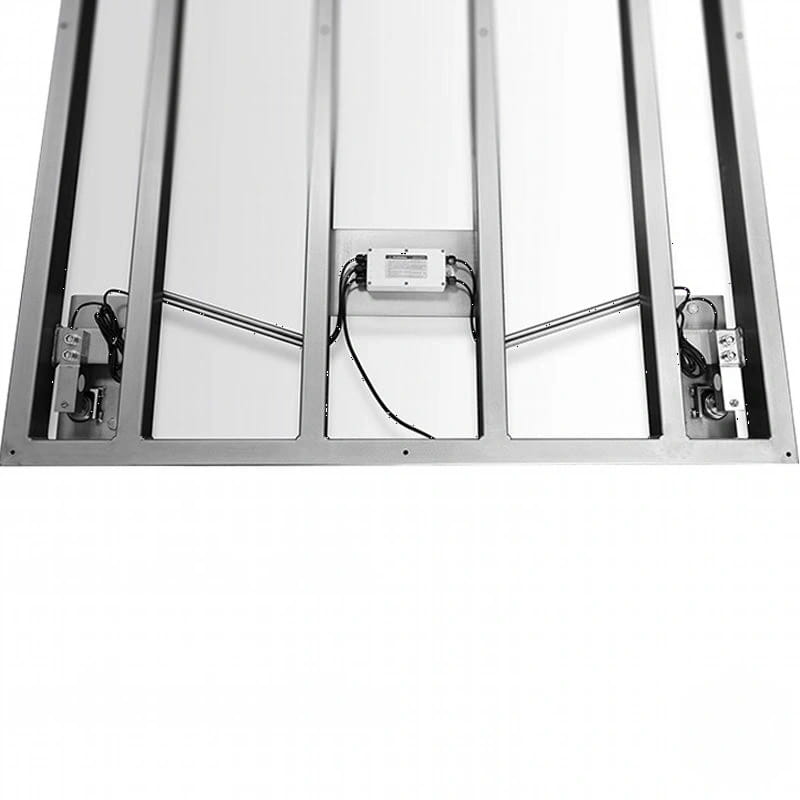 Silver-framed overhead garage door with integrated motor and cable system