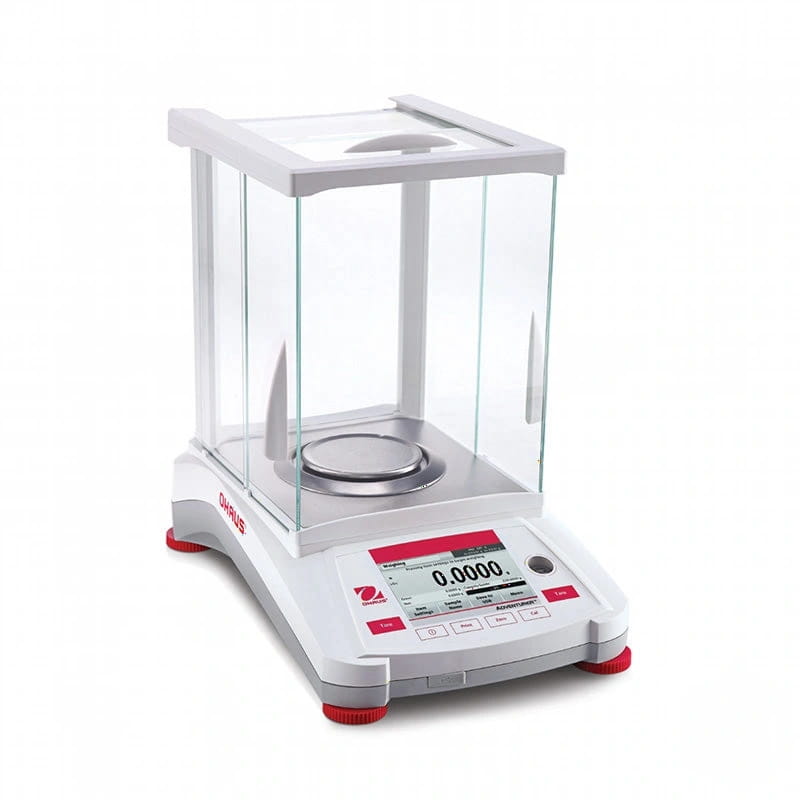 White and red ohaus analytical balance with a transparent glass draft shield