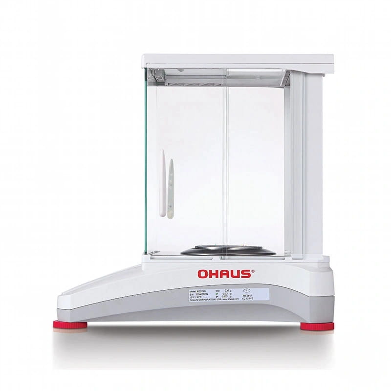 White ohaus analytical balance with a transparent glass enclosure and red-accented feet
