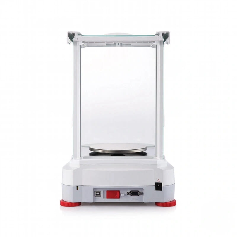 White analytical balance with red feet and a clear glass enclosure