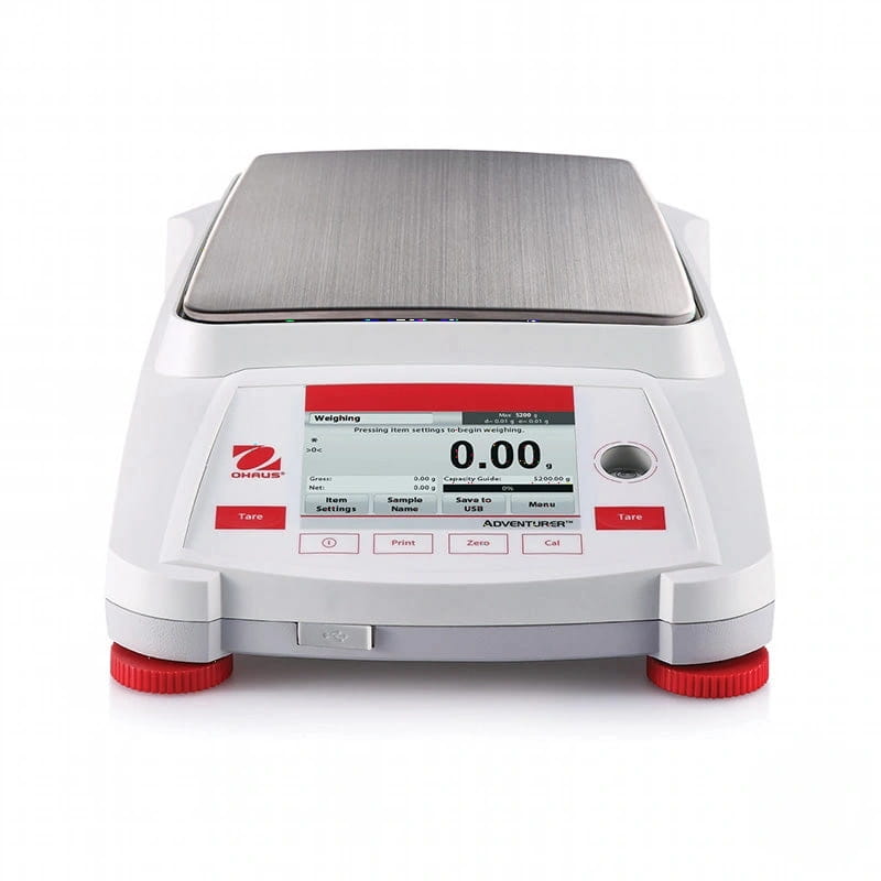 White ohaus adventurer digital scale with a brushed stainless steel weighing platform and red-accented feet