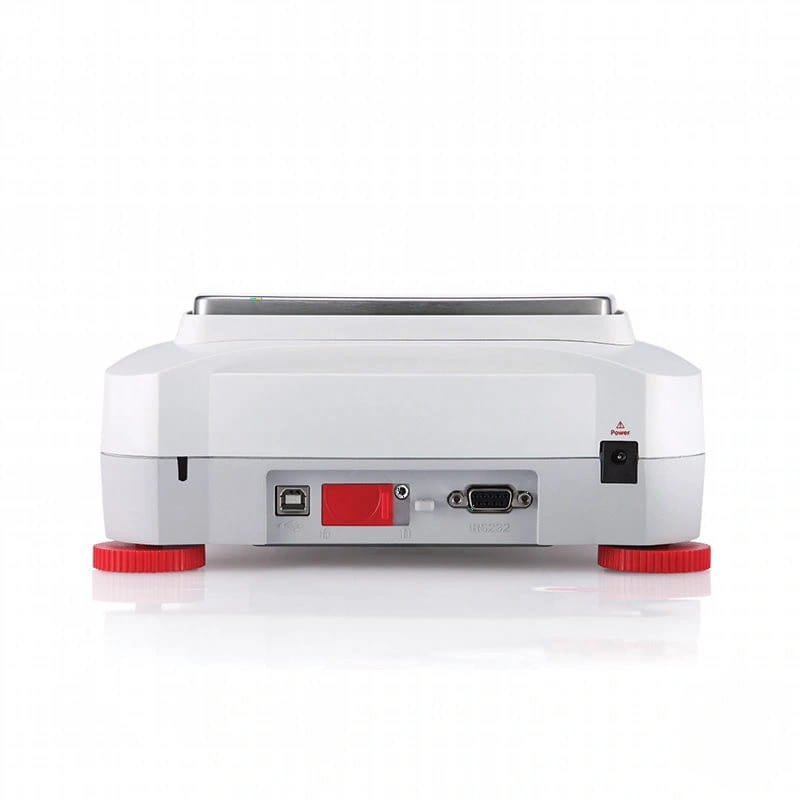 White laboratory balance with red feet and a silver weighing platform