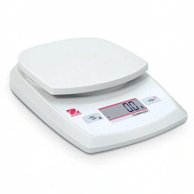 White plastic digital kitchen scale with a red-accented display and ’ohmus’ branding