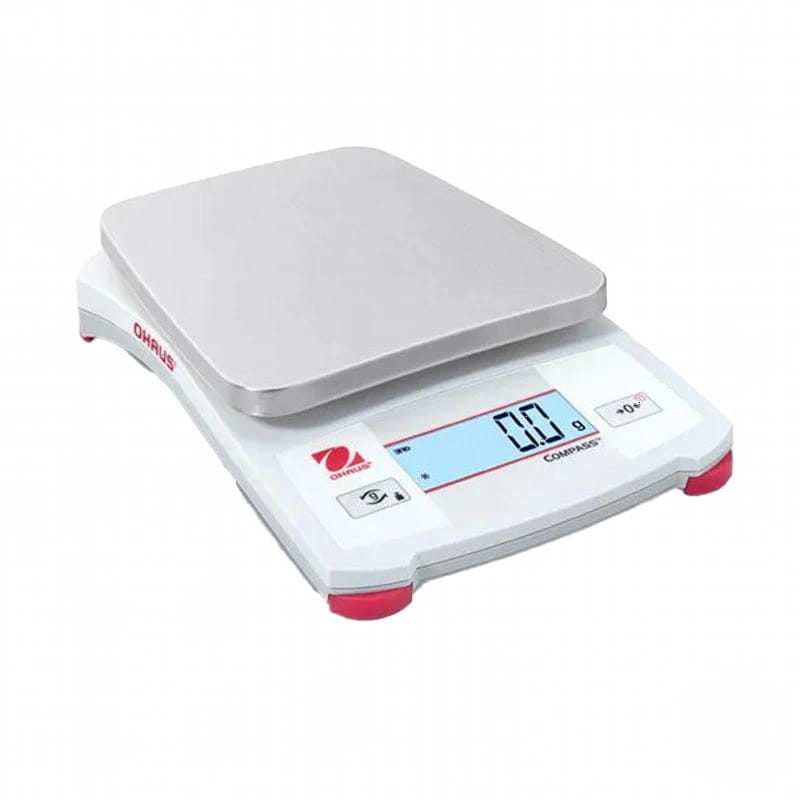 White and red ohaus compass digital scale with a silver weighing platform