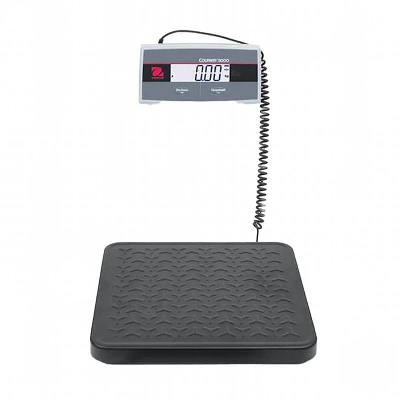 Black digital platform scale with a textured weighing surface and a coiled cable connecting to the display unit