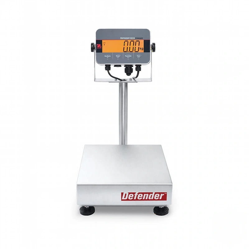 Silver stainless steel platform scale with a digital display showing ’0.00 kg’ and the brand name ’defender’ on its base