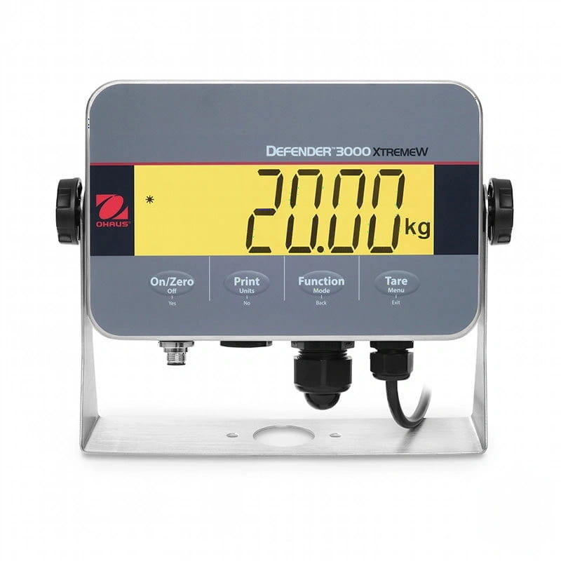Gray ohrus defender 3000 xtremew digital scale with a yellow display showing ’20.00 kg’ and black rotary knobs on either side