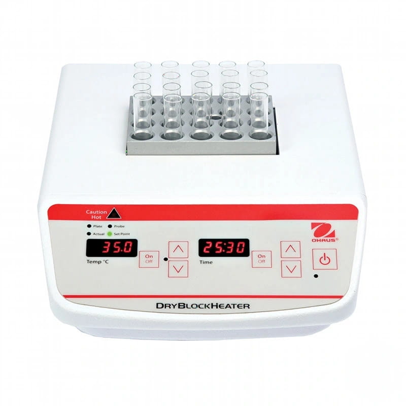 White and red ohaus dryblockheater with digital display showing temperature and time, featuring a silver tray holding clear glass test tubes