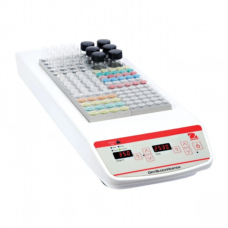 White and red digital dry block heater with a grid of clear test tubes and vials, some capped in black or colored lids