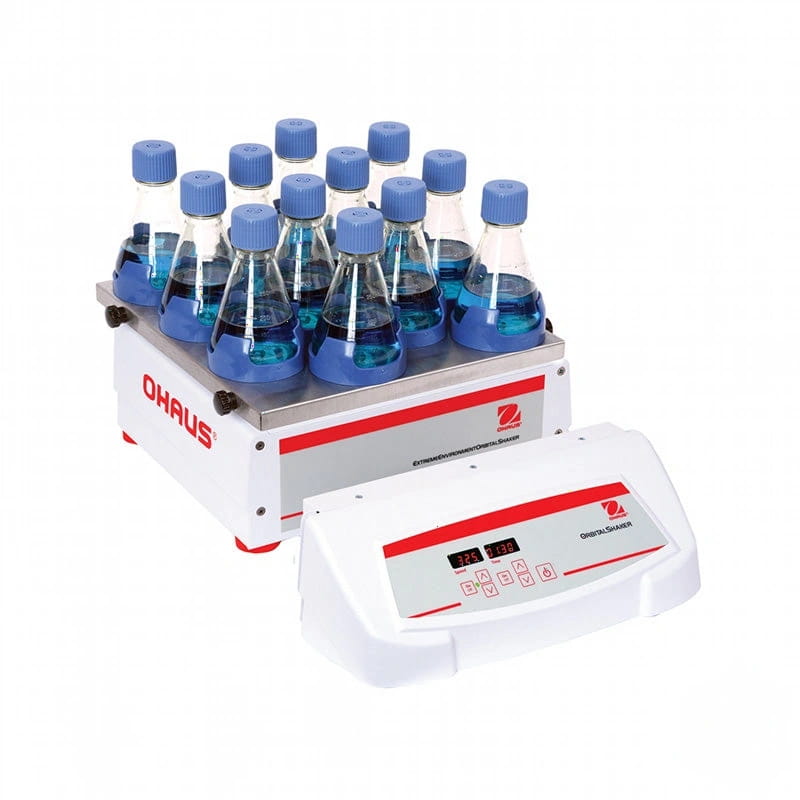 White and red ohaus orbital shaker with digital display, holding multiple glass flasks filled with blue liquid