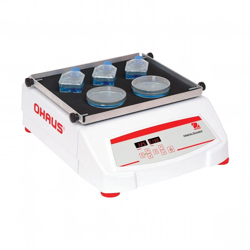 White and red ohaus orbital shaker with digital display, featuring a black platform holding clear containers filled with blue liquid