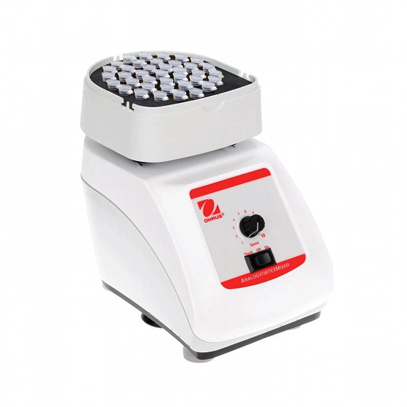 White and red ohaus analog vortex mixer with a circular top holding multiple clear test tubes