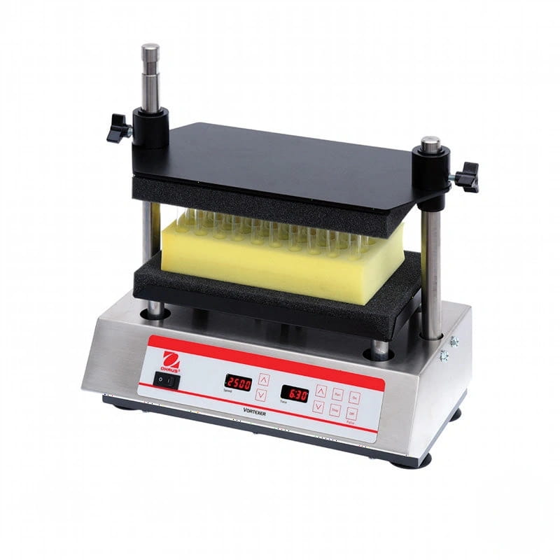 Silver and black vortexer lab mixer with a digital display showing settings, designed for precise mixing of liquid samples in microtiter plates
