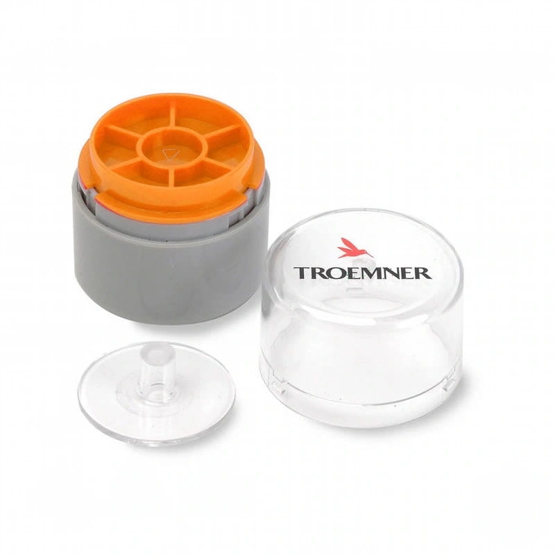 Clear plastic cylindrical container with orange and gray components, branded ’troemner’ on the lid