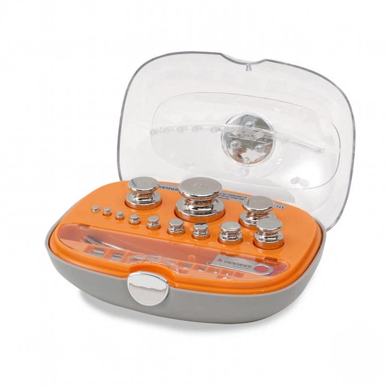 Orange and gray plastic case containing a set of silver-toned metal calibration weights