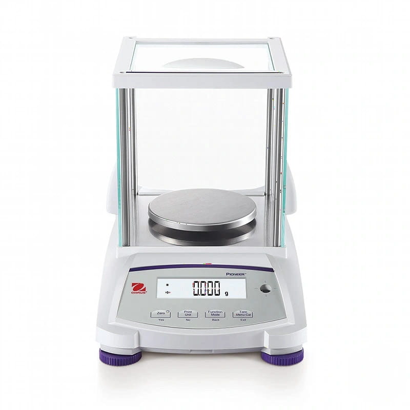 White analytical balance with a transparent glass draft shield, silver weighing platform, and digital display showing ’0.000 g’
