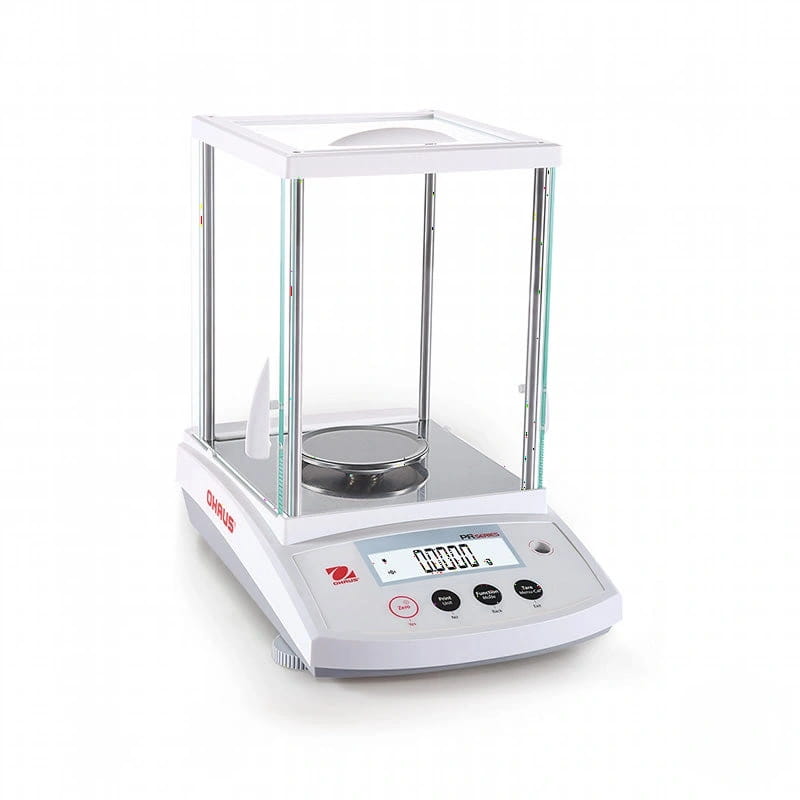 White analytical balance with a transparent glass draft shield and digital display