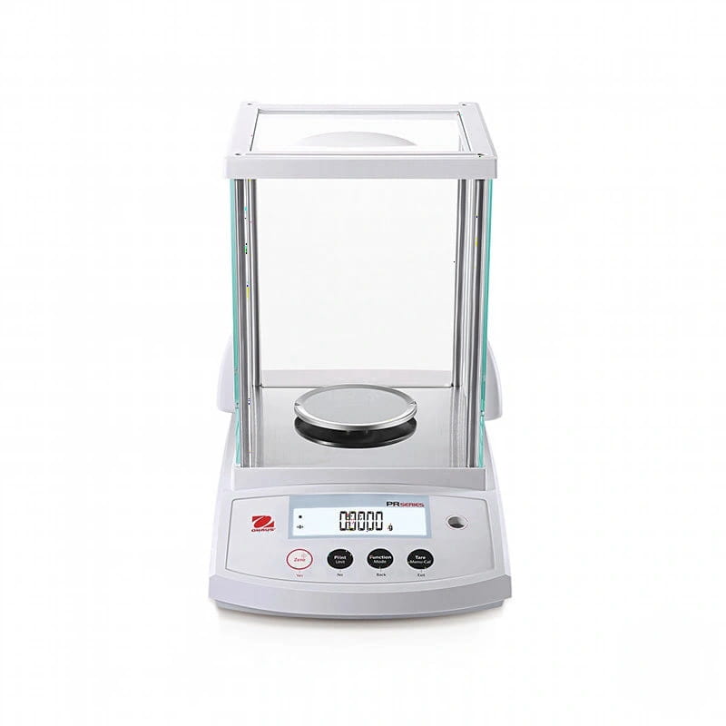 White analytical balance with a transparent glass draft shield and digital display showing zero grams