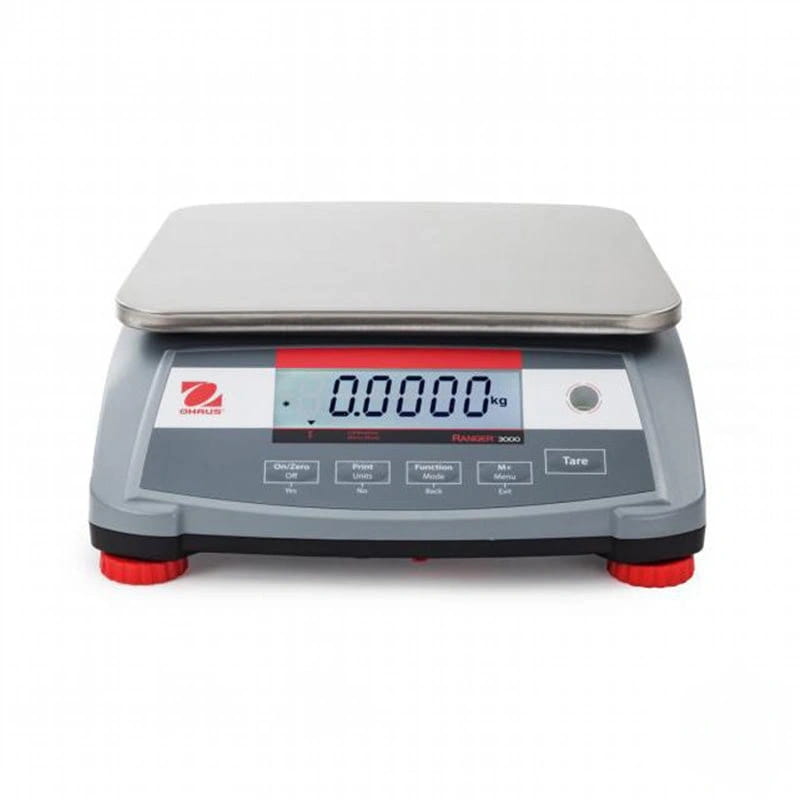 Gray digital scale with a stainless steel weighing platform and red-accented feet, featuring the ohaus brand logo