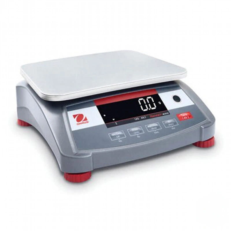 Gray ohaus digital scale with a silver weighing platform and red-accented feet