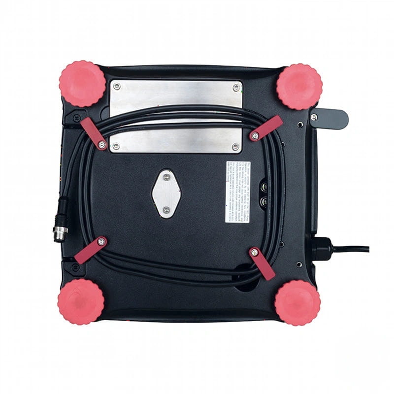 Black electric griddle with pink rubber feet and a coiled black power cord