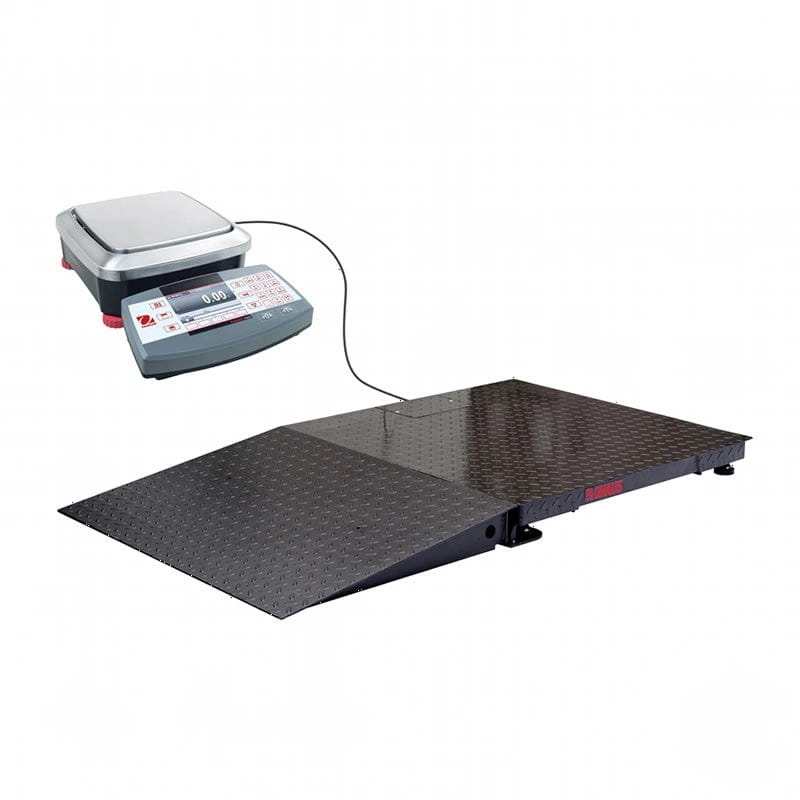 Industrial-grade digital platform scale with a black diamond plate surface and silver weighing platform, connected to its control unit by a cable