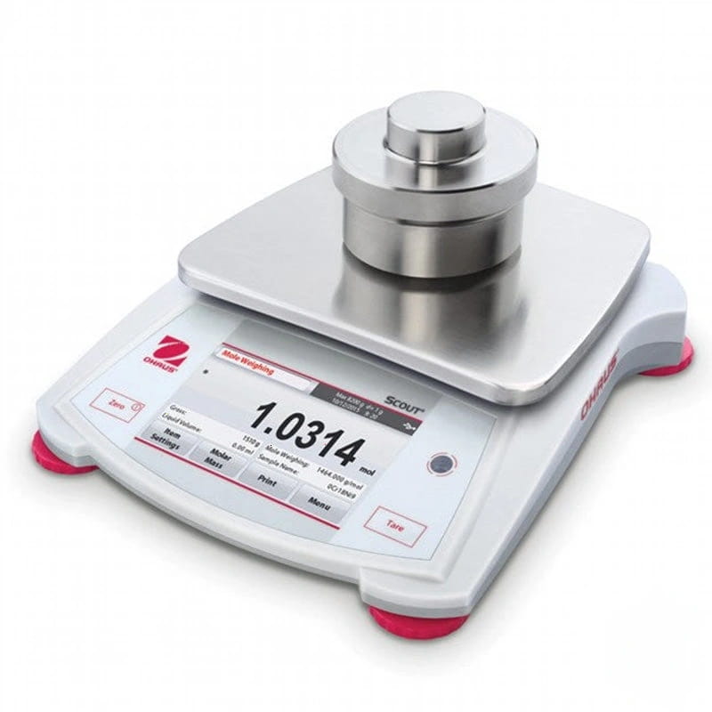 Silver-toned digital laboratory scale with a sleek white base and red feet, featuring a stainless steel weighing platform topped by a matching cylindrical weight
