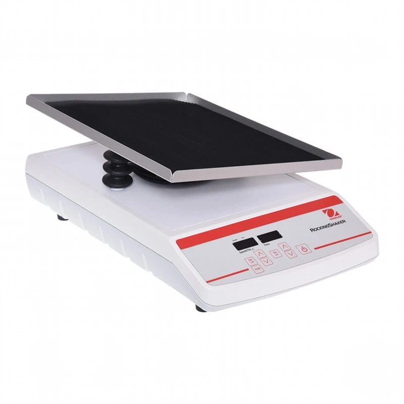 White roche diagnostics laboratory shaker with a black, rectangular platform and red-accented control panel
