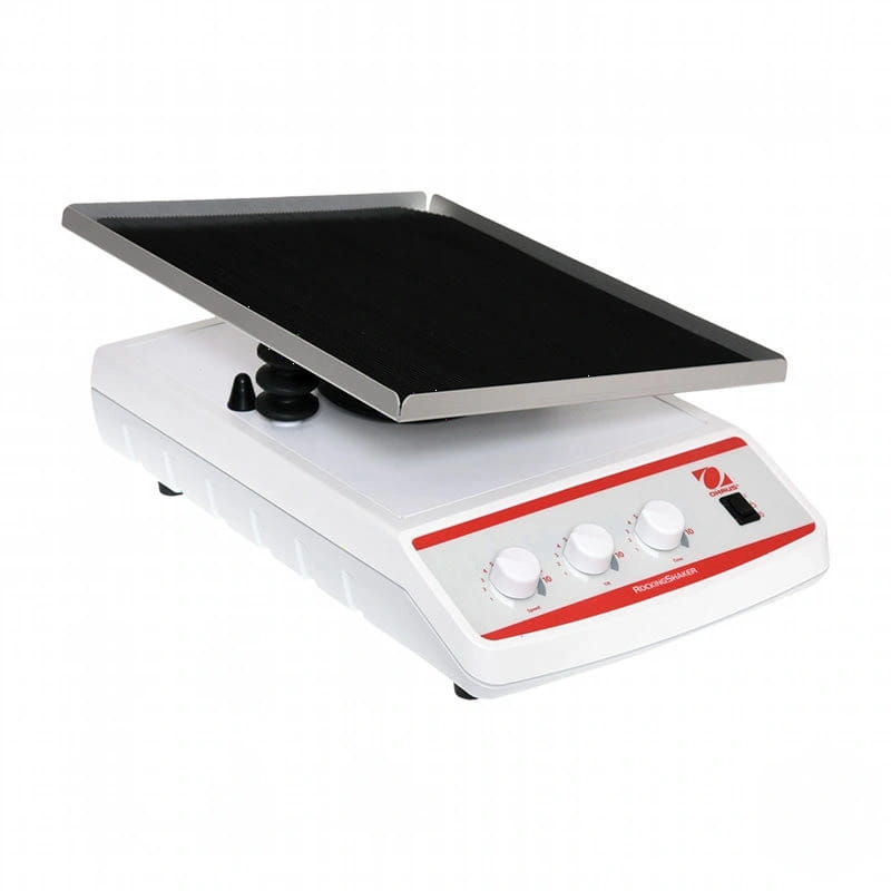 White and red laboratory rocker mixer with a black, rectangular platform