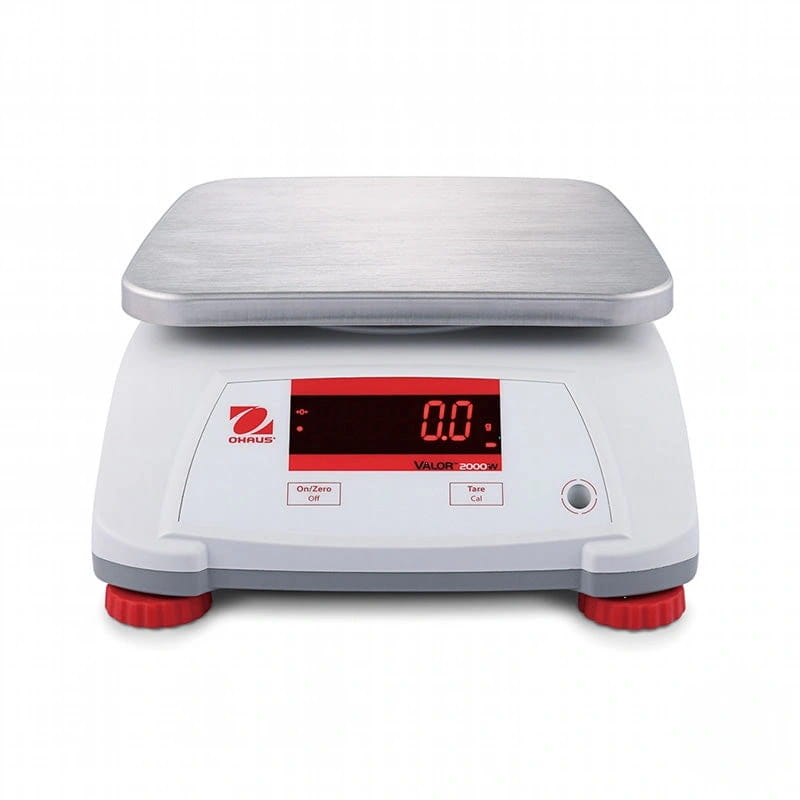 White ohaus valor 2000 digital scale with a brushed stainless steel weighing platform and red-accented display