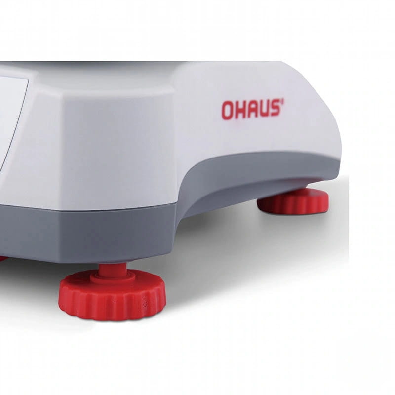 White and gray ohaus laboratory scale with red, ribbed foot pads