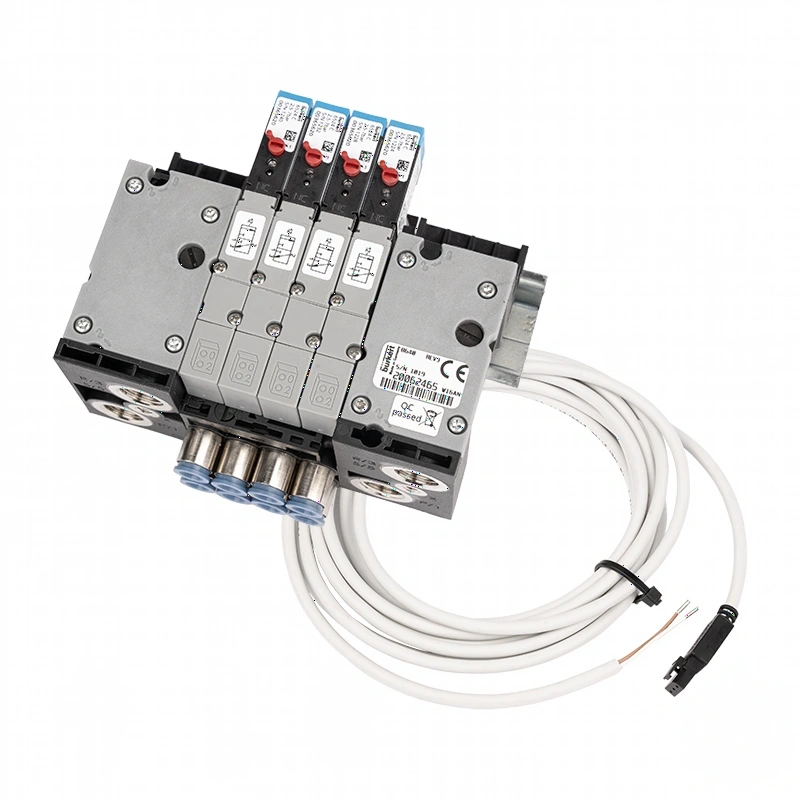 Silver-colored industrial pneumatic valve block with black and blue components, featuring multiple ports and a coiled white cable