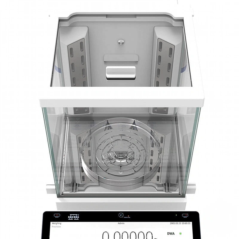 White analytical balance with a transparent glass enclosure and silver-toned weighing platform