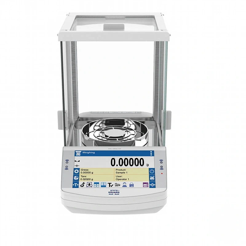 White analytical balance with a digital display showing zero weight, featuring a transparent glass draft shield and a metallic weighing pan