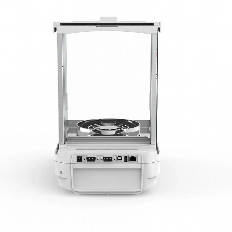 White analytical balance with a stainless steel weighing pan and multiple connectivity ports on its base